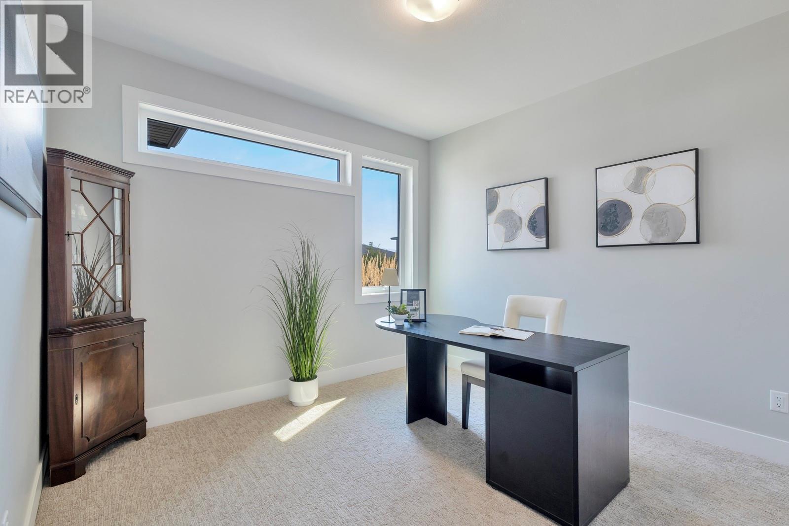 Additional bedroom/office space with a closet on the entry level - 2594 Crown Crest Drive, West Kelowna, BC - Indoor Photo Showing Office