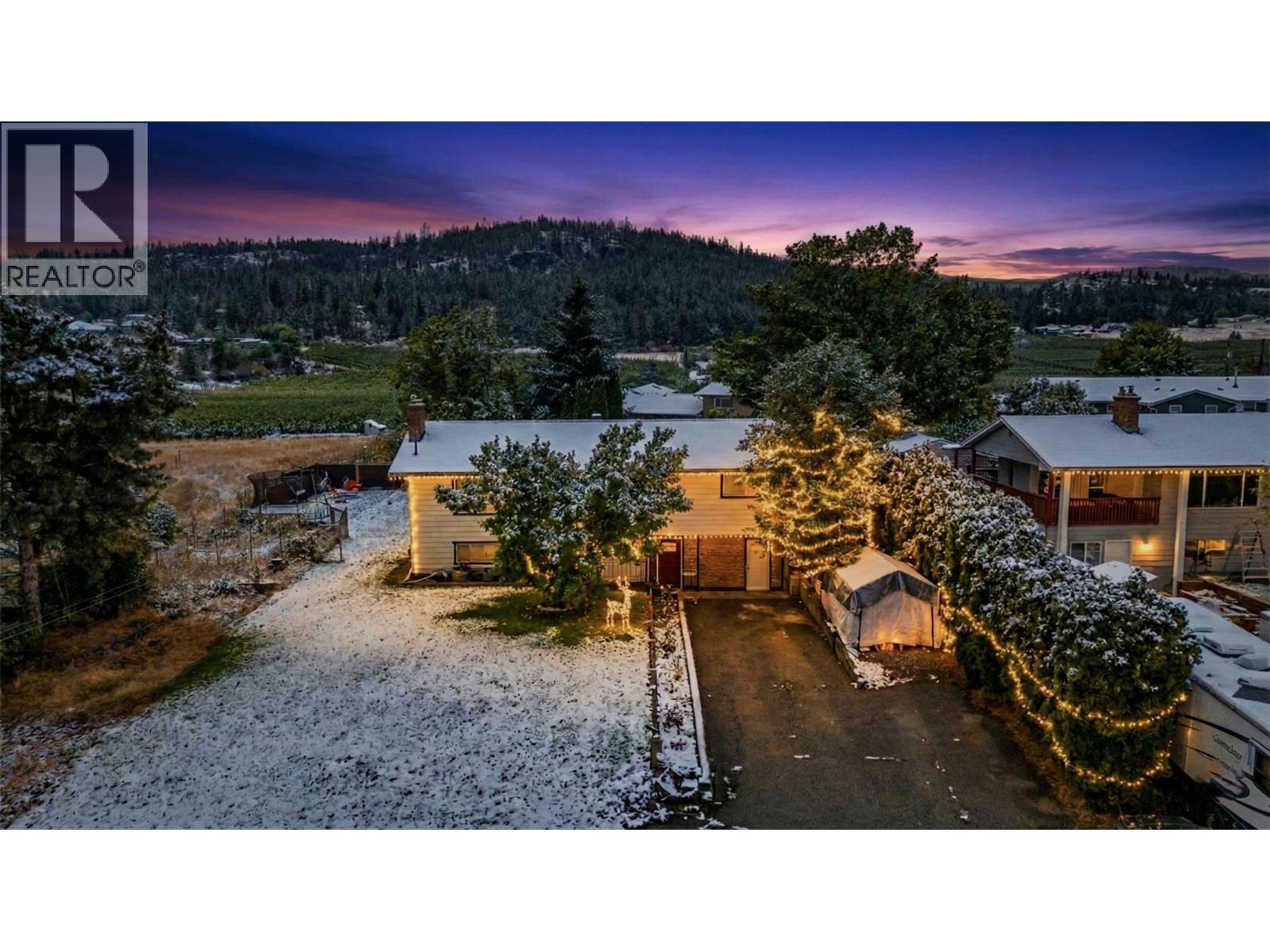 Virtually staged photo for Exterior - 10010 Kel Win Road, Lake Country, BC - Outdoor With View