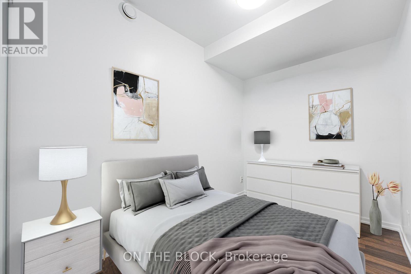 Virtually Staged 2nd Bedroom - 302 - 38 Joe Shuster Way, Toronto, ON - Indoor Photo Showing Bedroom