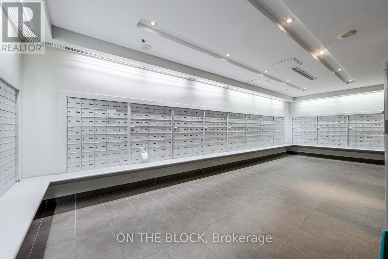 Mail Area - 302 - 38 Joe Shuster Way, Toronto, ON - Indoor Photo Showing Other Room