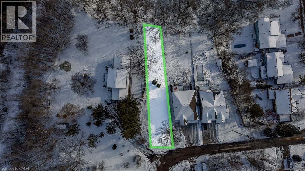 Aerial view of property and surrounding area with property boundaries highlighted - 54 Roos Street, Kitchener, ON