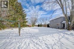 View of yard layered in snow -