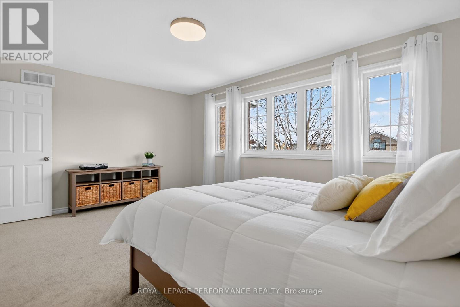 Sun pours in through these fabulous Windows! - 1910 Schroeder Crescent, Ottawa, ON - Indoor Photo Showing Bedroom