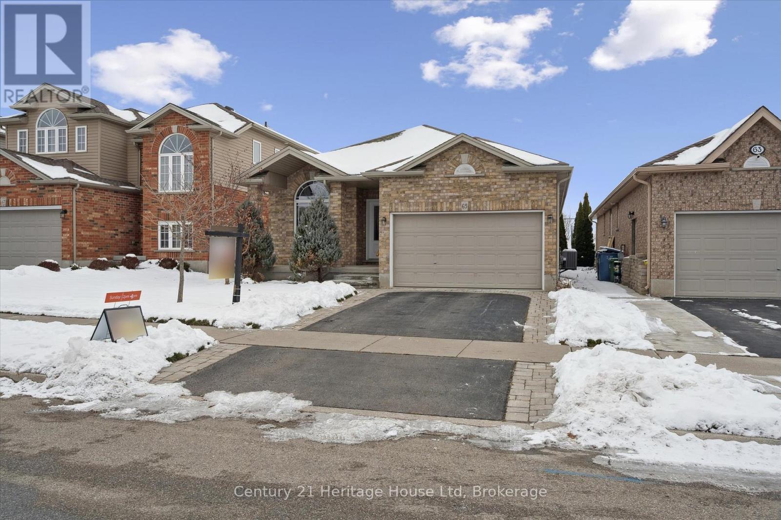 65 Norton Drive, Guelph (Grange Road), ON - Outdoor With Facade