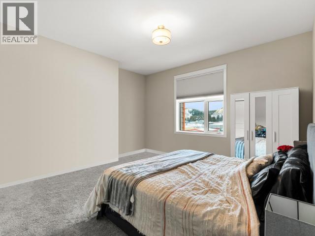 405-36 Waterfront Place, Whitehorse, YT - Indoor Photo Showing Bedroom