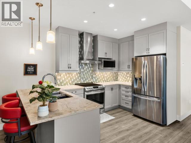 405-36 Waterfront Place, Whitehorse, YT - Indoor Photo Showing Kitchen With Stainless Steel Kitchen With Upgraded Kitchen