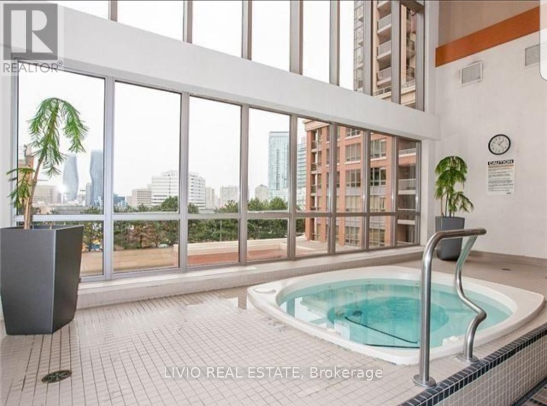 509 - 4080 Living Arts Drive, Mississauga, ON - Indoor Photo Showing Other Room With In Ground Pool