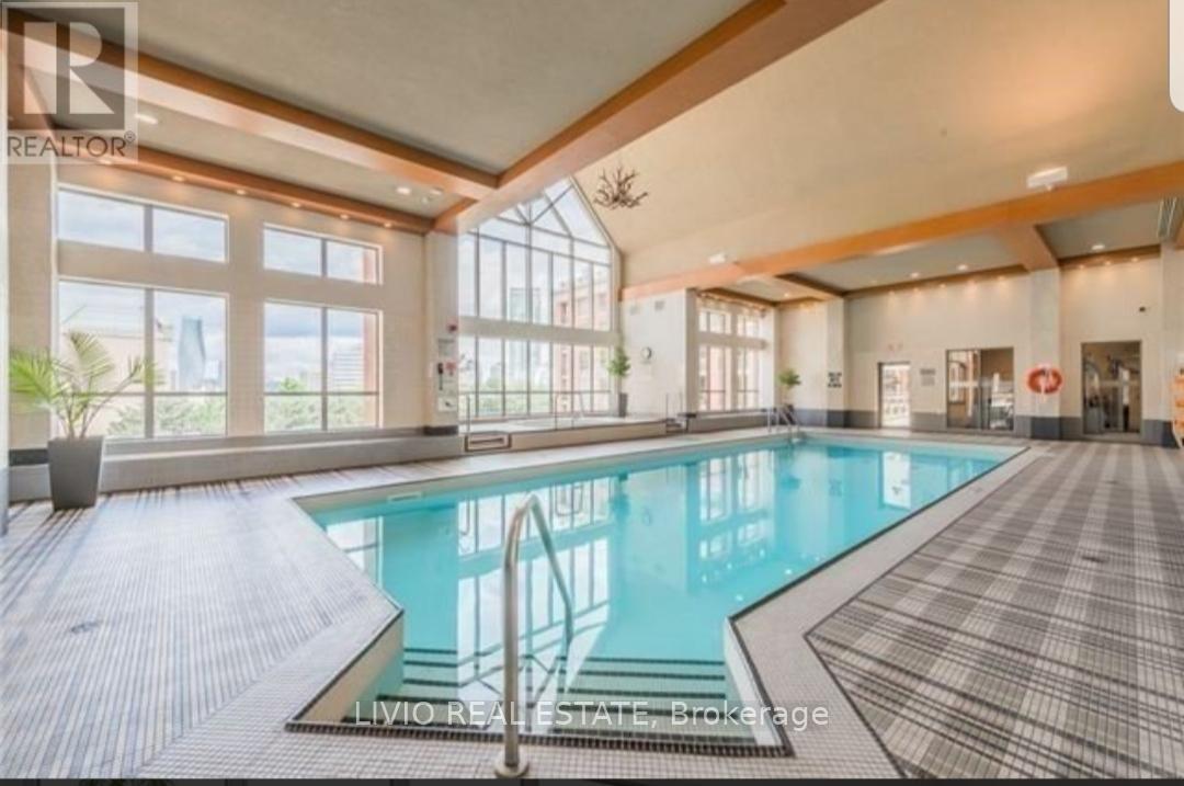 509 - 4080 Living Arts Drive, Mississauga, ON - Indoor Photo Showing Other Room With In Ground Pool