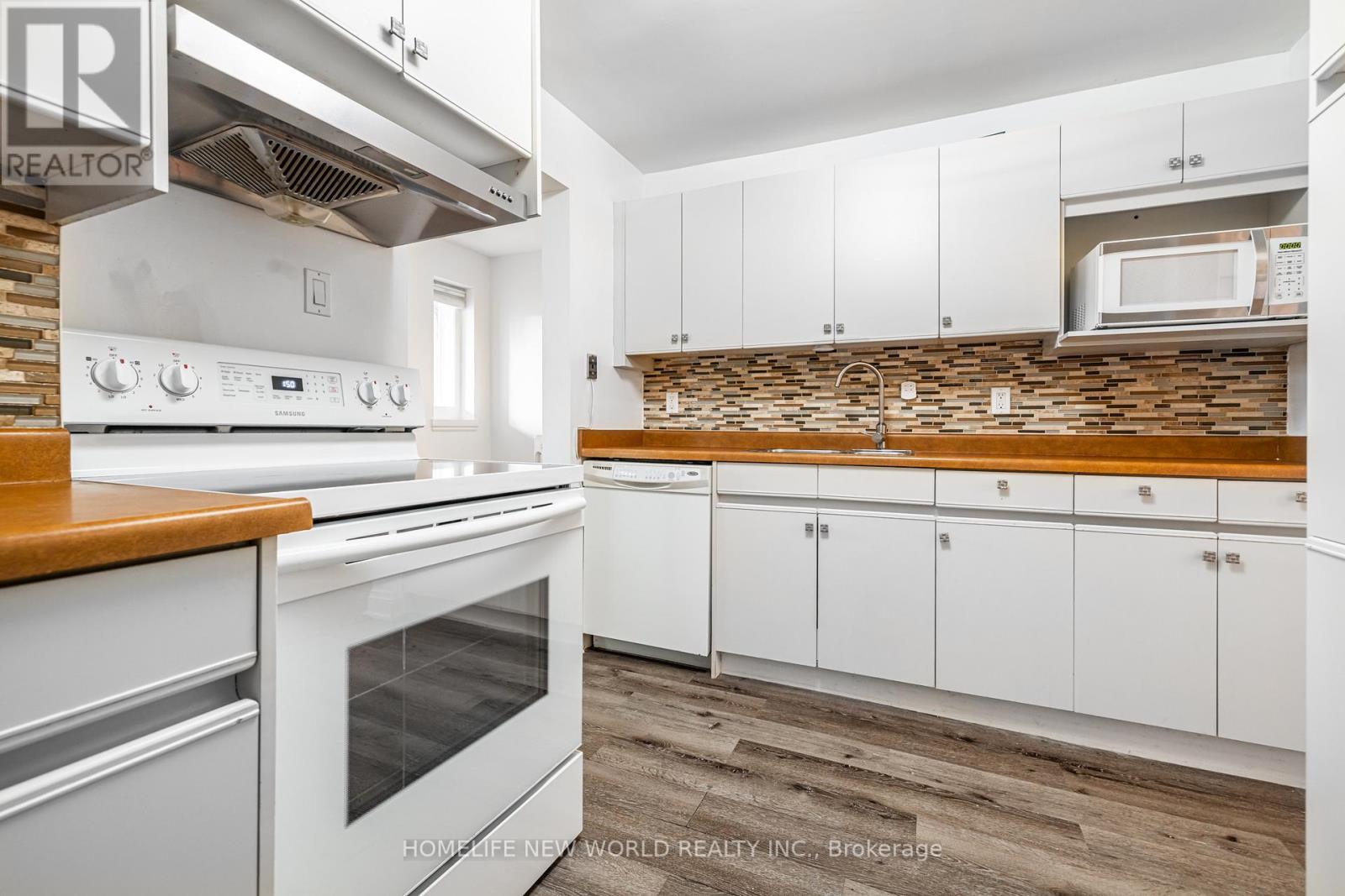 1107 Royal York Road, Toronto, ON - Indoor Photo Showing Kitchen With Double Sink