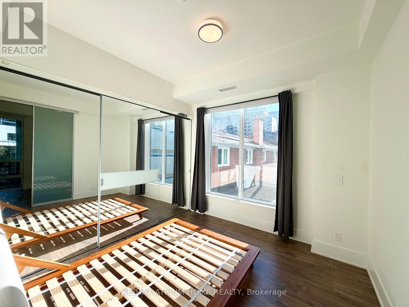 221 - 38 Cameron Street, Toronto, ON - Indoor Photo Showing Bedroom