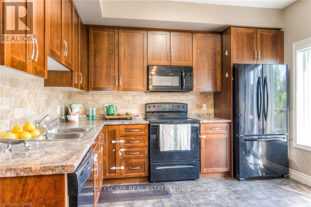 4A - 38 Howe Drive, Kitchener, ON - Indoor Photo Showing Kitchen With Double Sink
