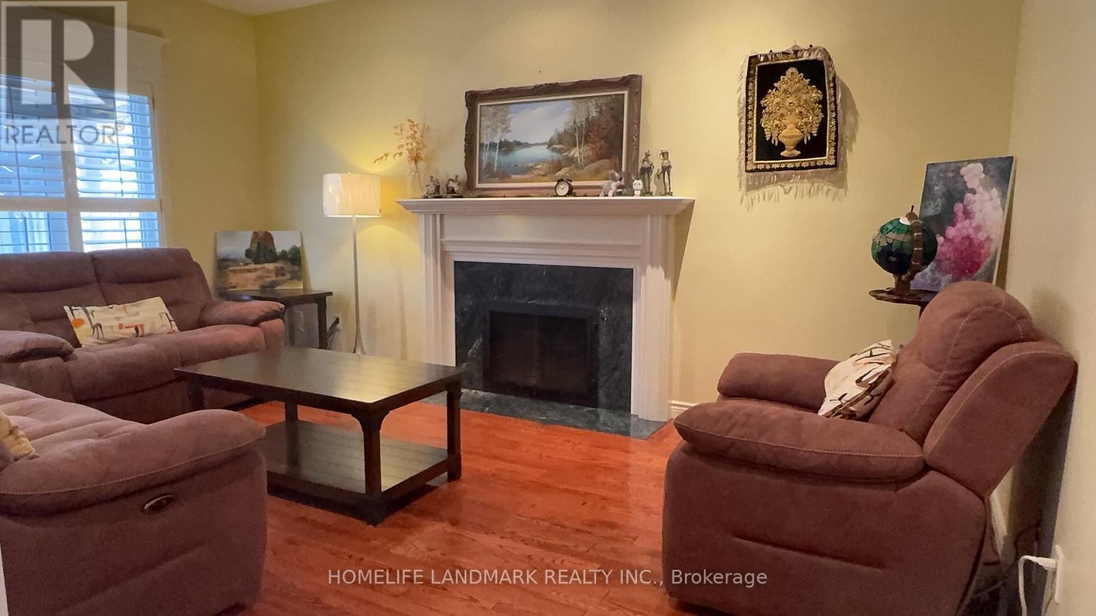 136 Worth Boulevard, Vaughan, ON - Indoor Photo Showing Living Room With Fireplace