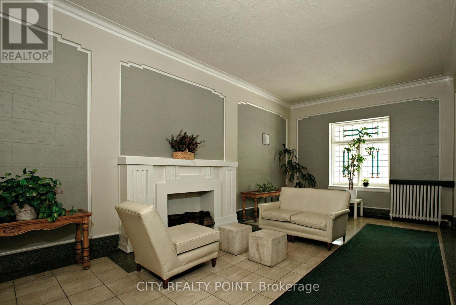 520 - 396 Avenue Road, Toronto, ON - Indoor With Fireplace