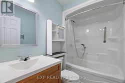 Main Bathroom with tub shower combination. -