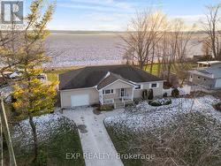 Open farm field behind back yard. -