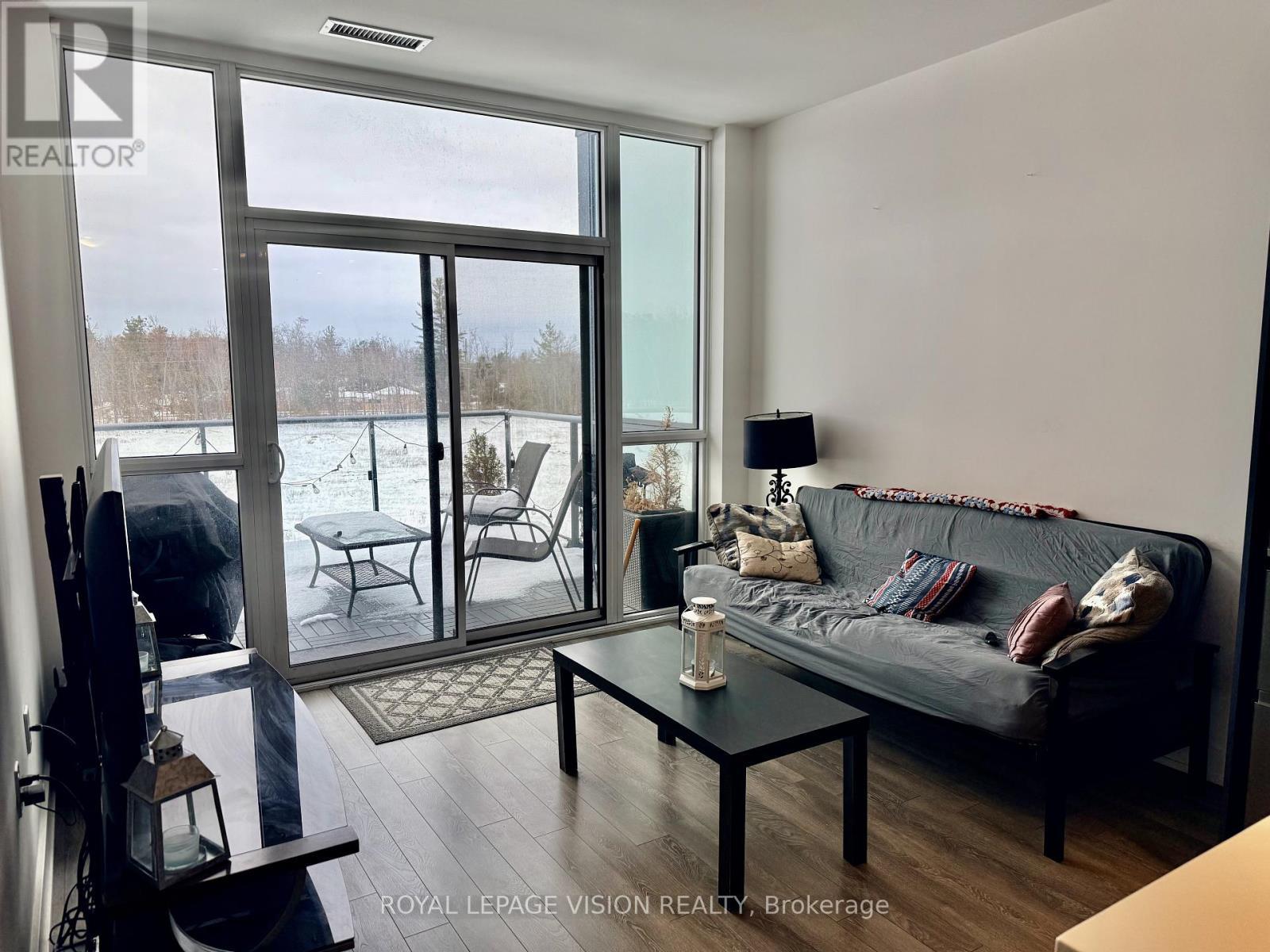 407 - 375 Sea Ray Avenue, Innisfil, ON - Indoor Photo Showing Living Room