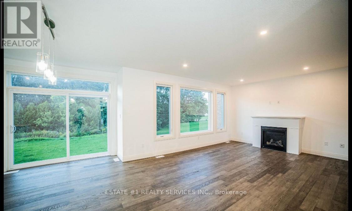 20 Ferris Boulevard W, Zorra, ON - Indoor Photo Showing Living Room With Fireplace