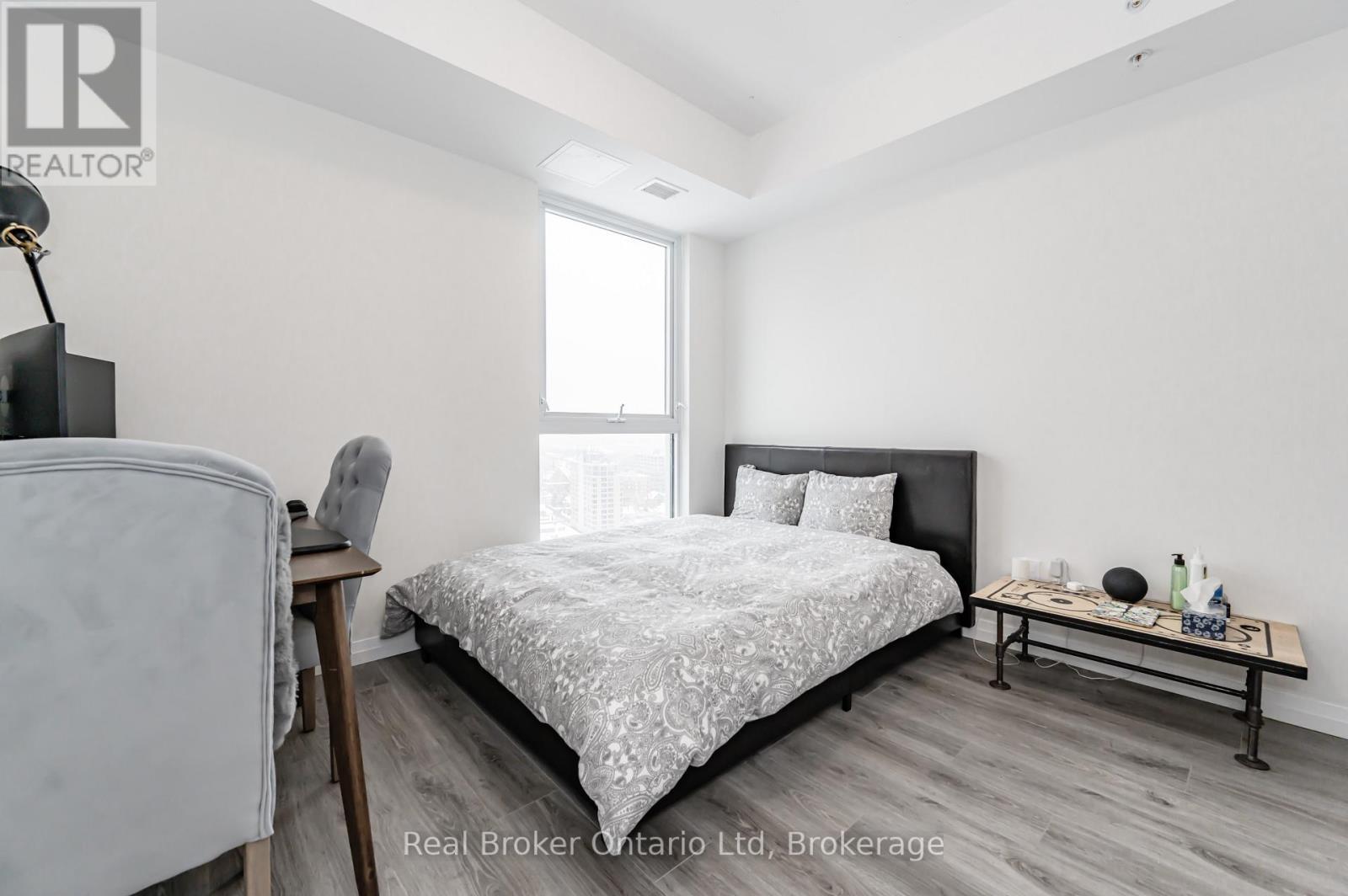 2003 - 60 Charles Street W, Kitchener, ON - Indoor Photo Showing Bedroom