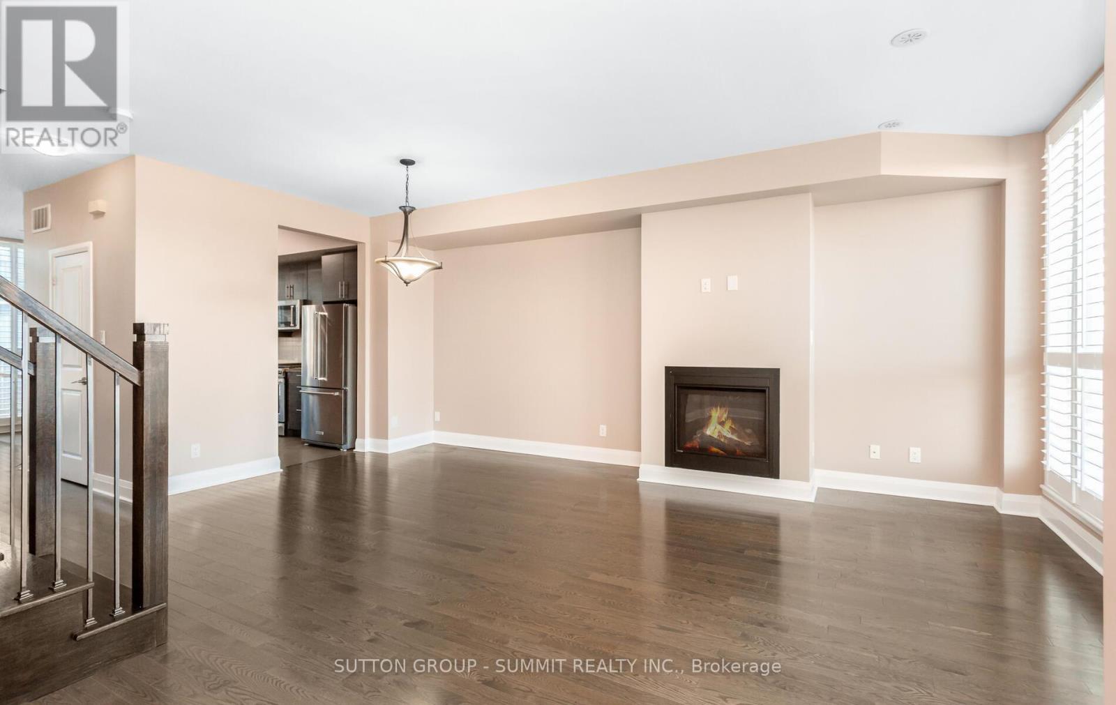 6 - 70 Littlecreek Road, Mississauga, ON - Indoor Photo Showing Living Room With Fireplace