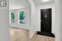 FOYER AREA OPENS TO THE LIVING ROOM -