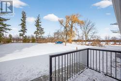 Back yard with Second Driveway off of Range Rd -