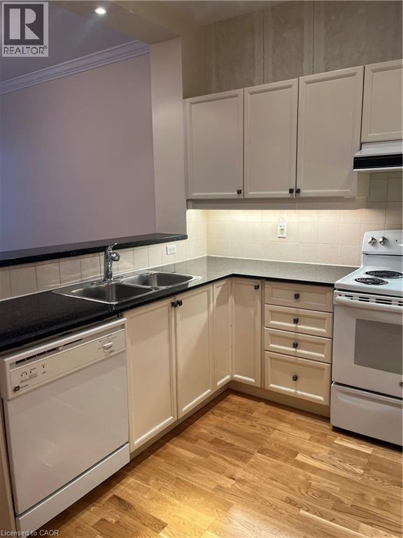 1 Leaside Park Drive Unit# 419, Toronto, ON - Indoor Photo Showing Kitchen With Double Sink