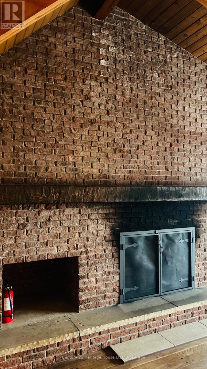 Fireplace - 500 Lakeshore Road, Fort Erie (Lakeshore), ON - Indoor Photo Showing Living Room With Fireplace