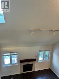 587 Oxbow Crescent, Collingwood, ON - Indoor Photo Showing Other Room With Fireplace