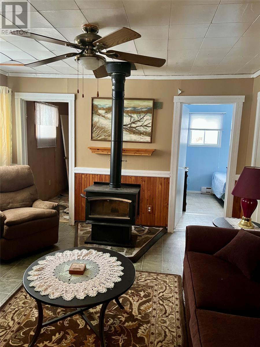 14 Main Street, Buchans Junction, NL - Indoor Photo Showing Living Room With Fireplace