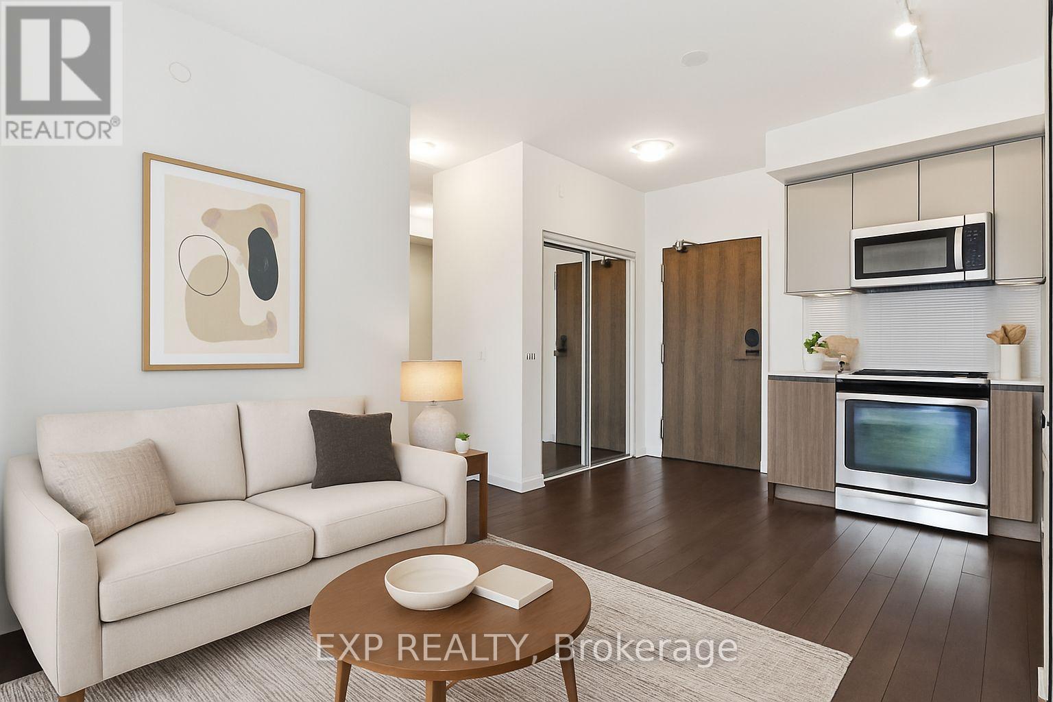 VIRTUALLY STAGED TO SHOW POSSIBILITIES - 730 - 100 Eagle Rock Way, Vaughan, ON - Indoor Photo Showing Living Room