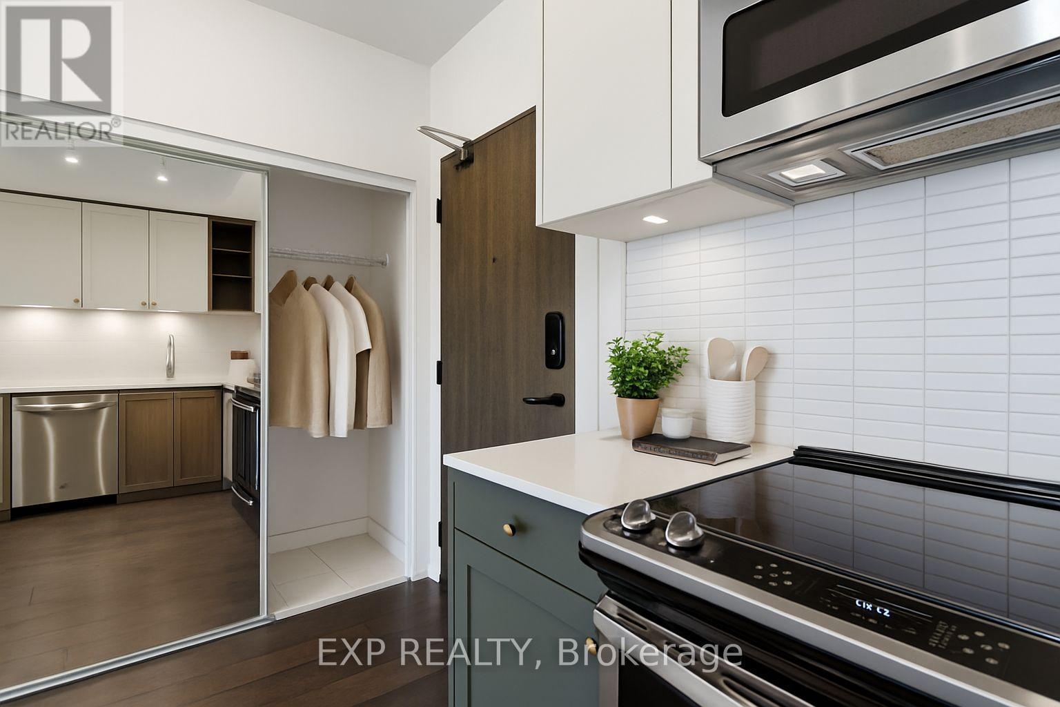 VIRTUALLY STAGED TO SHOW POSSIBILITIES - 730 - 100 Eagle Rock Way, Vaughan, ON - Indoor Photo Showing Kitchen With Stainless Steel Kitchen