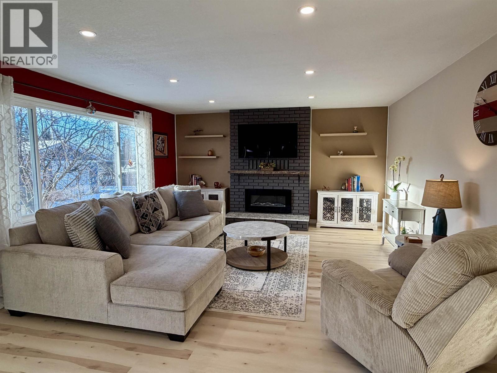 152 Vanderview Drive, Vanderhoof, BC - Indoor Photo Showing Living Room With Fireplace
