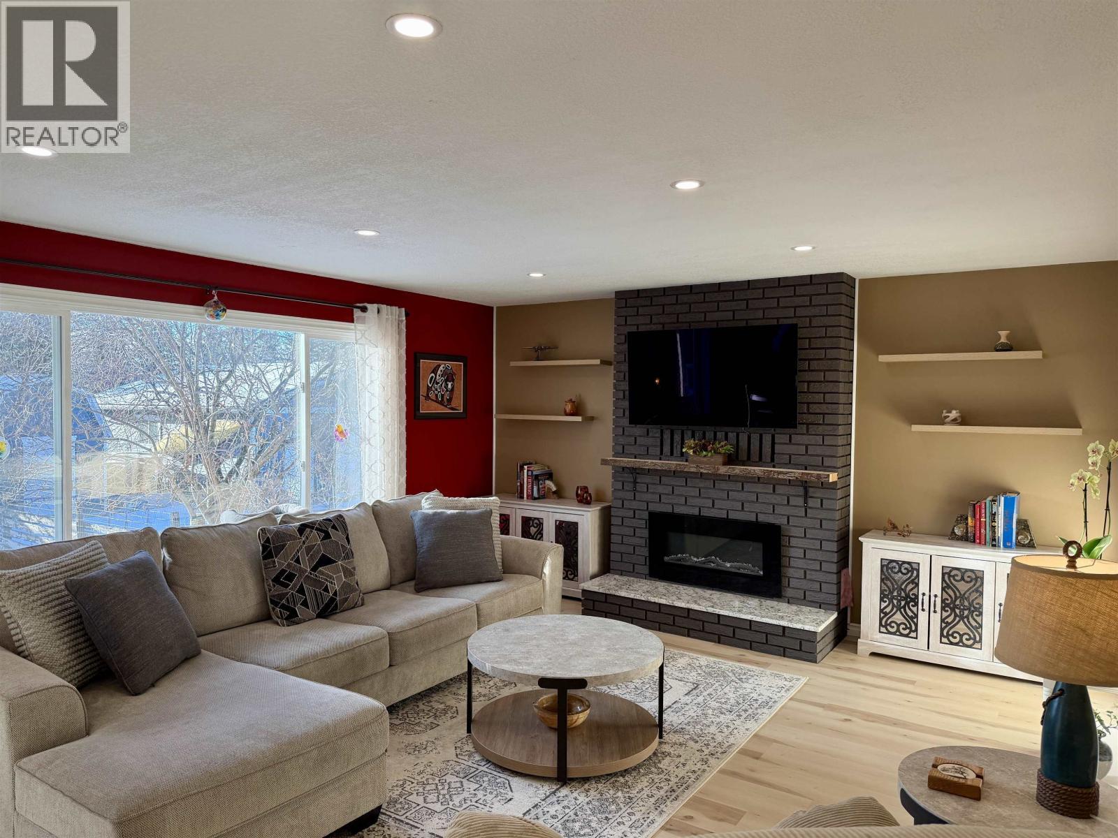 152 Vanderview Drive, Vanderhoof, BC - Indoor Photo Showing Living Room With Fireplace