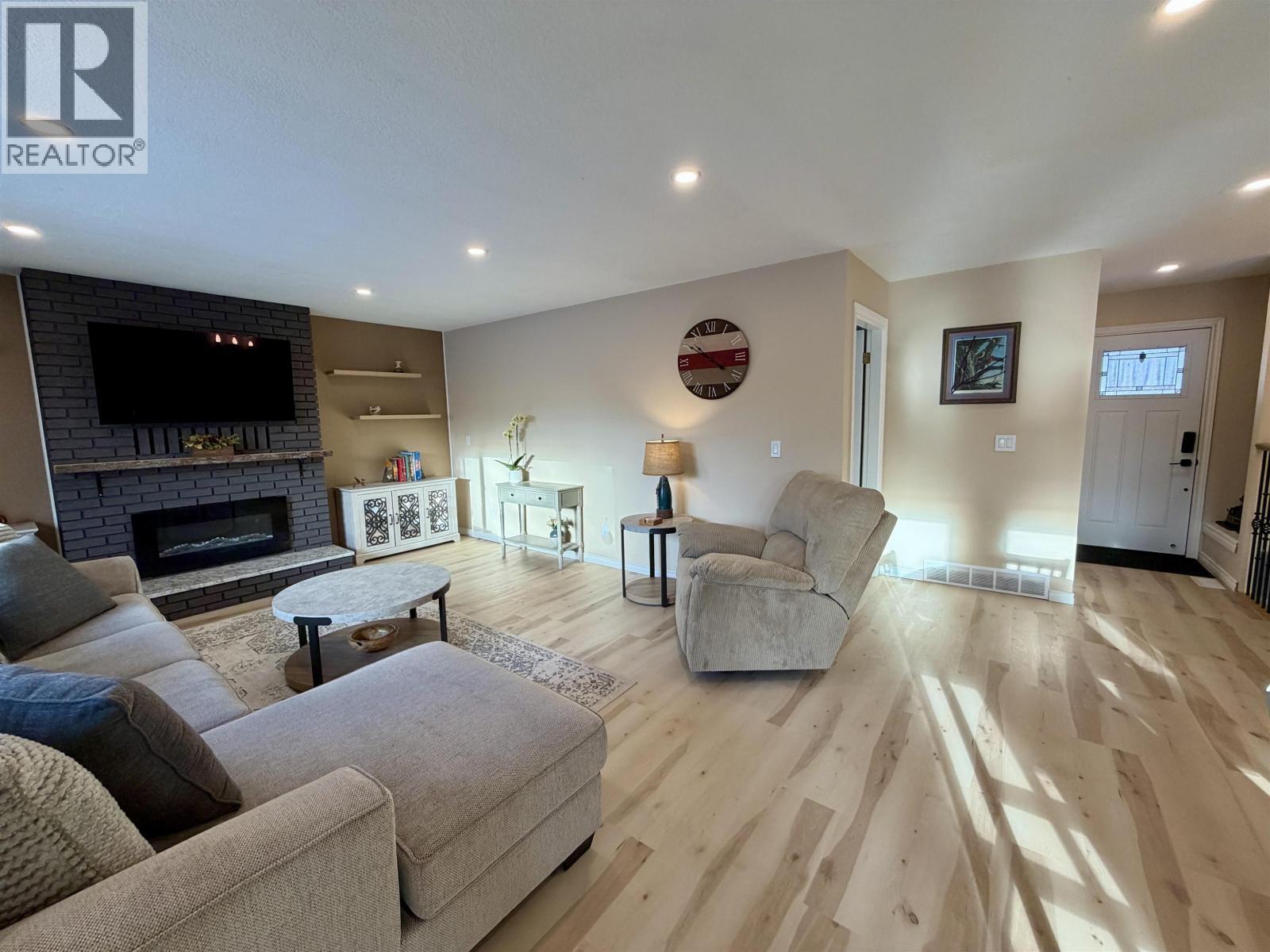 152 Vanderview Drive, Vanderhoof, BC - Indoor Photo Showing Living Room With Fireplace