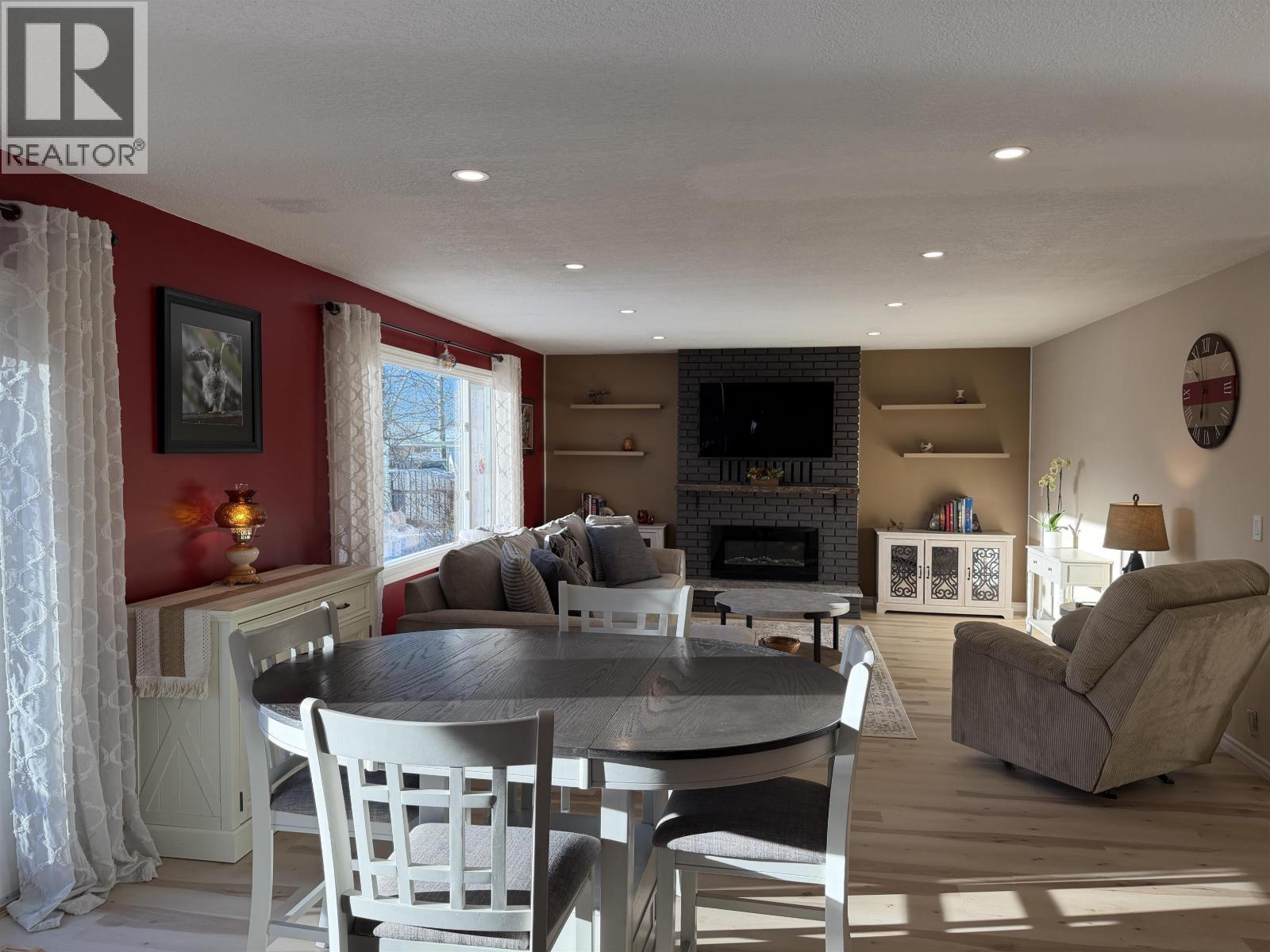 152 Vanderview Drive, Vanderhoof, BC - Indoor Photo Showing Other Room With Fireplace