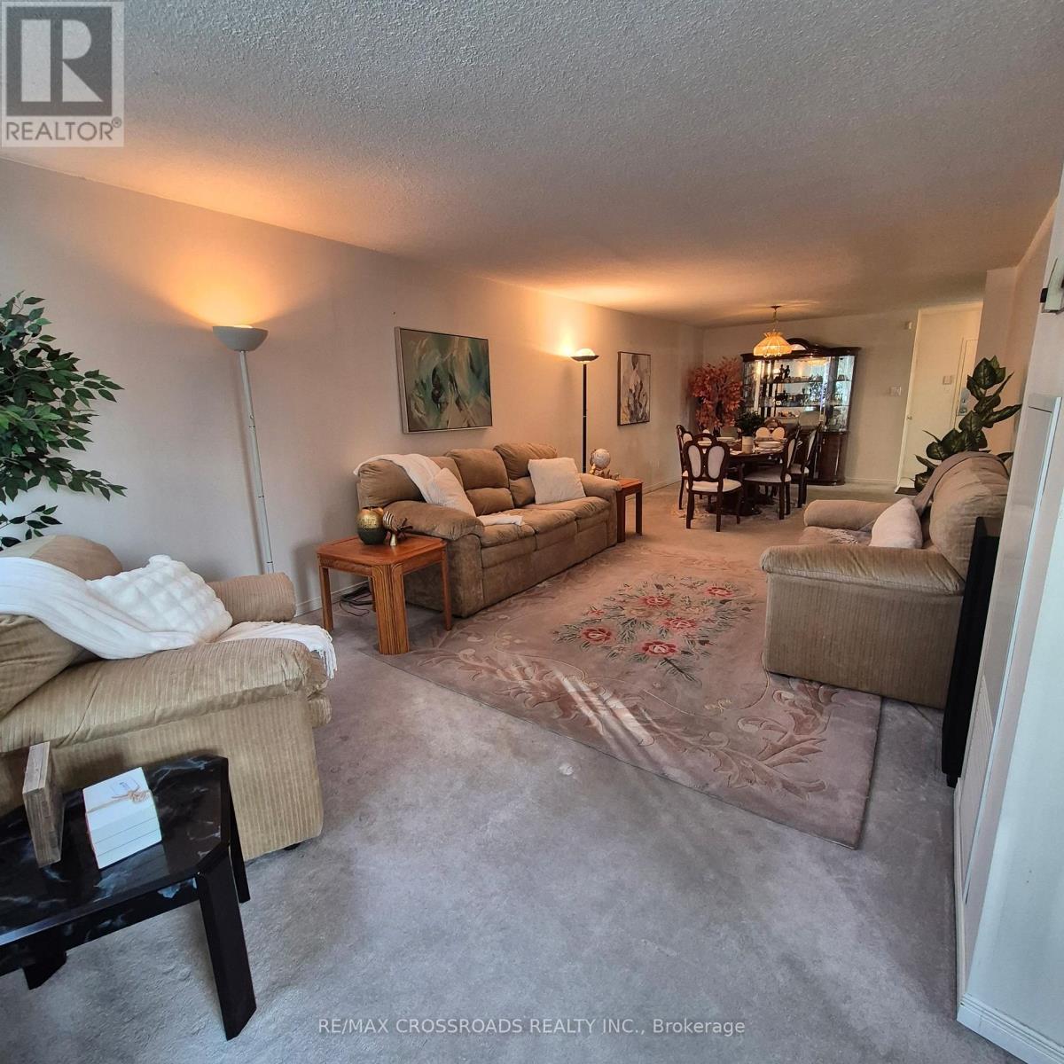 207 - 45 Huntingdale Boulevard, Toronto, ON - Indoor Photo Showing Living Room