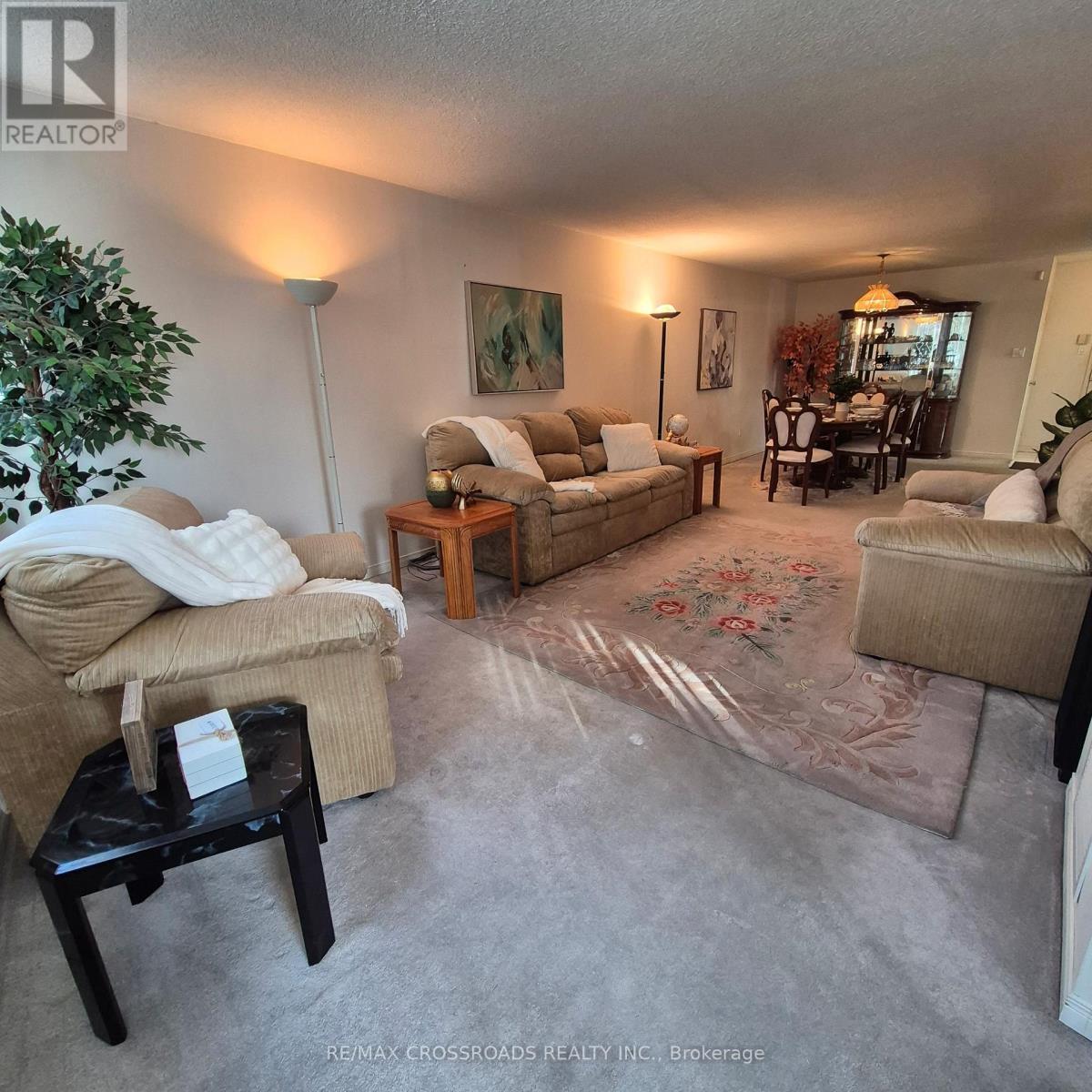 207 - 45 Huntingdale Boulevard, Toronto, ON - Indoor Photo Showing Living Room