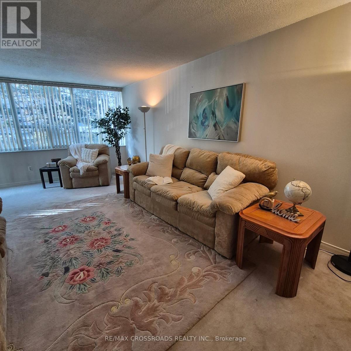 207 - 45 Huntingdale Boulevard, Toronto, ON - Indoor Photo Showing Living Room