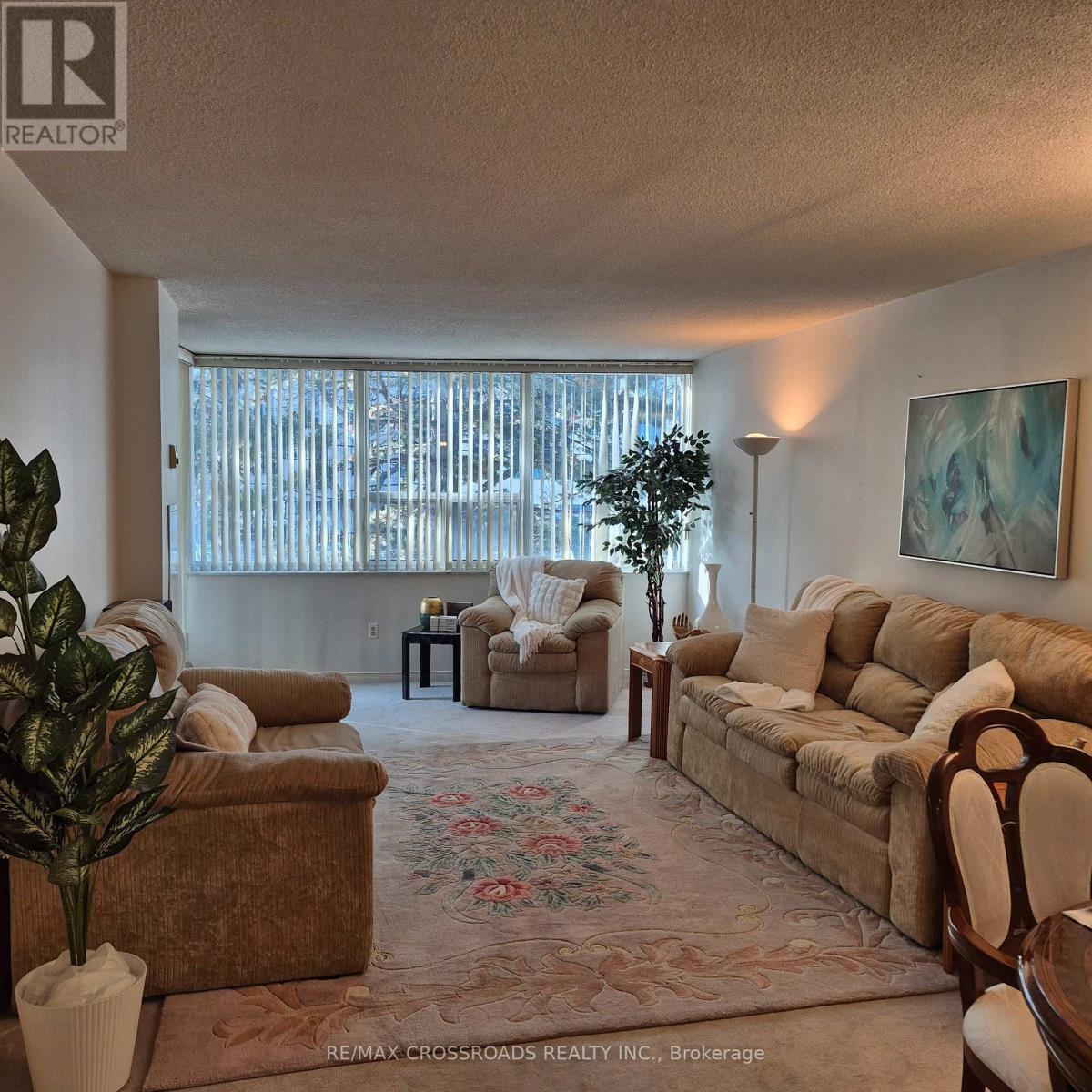 207 - 45 Huntingdale Boulevard, Toronto, ON - Indoor Photo Showing Living Room