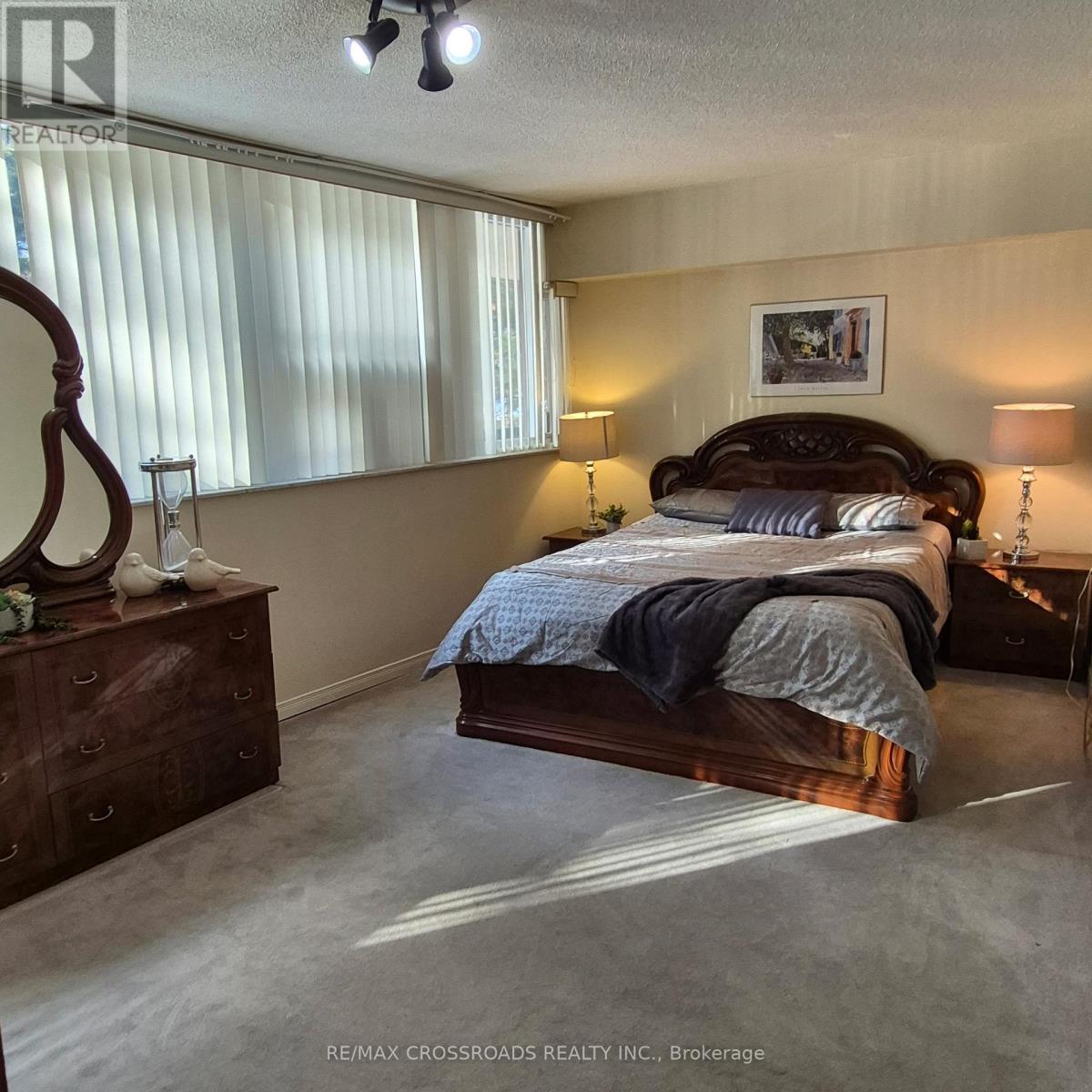 207 - 45 Huntingdale Boulevard, Toronto, ON - Indoor Photo Showing Bedroom