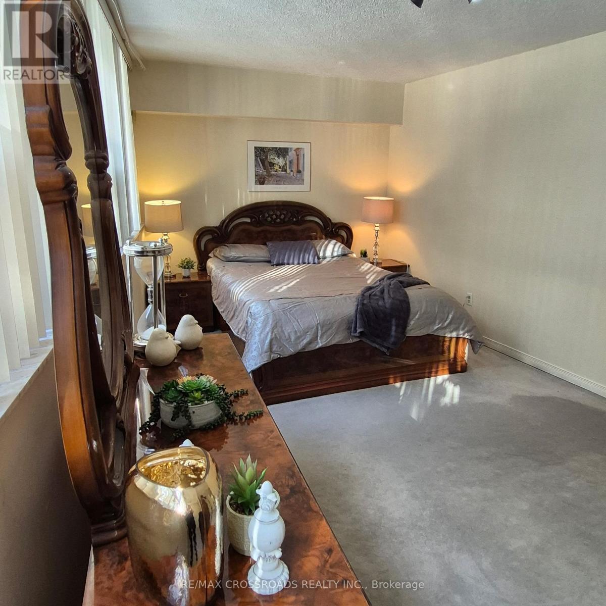 207 - 45 Huntingdale Boulevard, Toronto, ON - Indoor Photo Showing Bedroom
