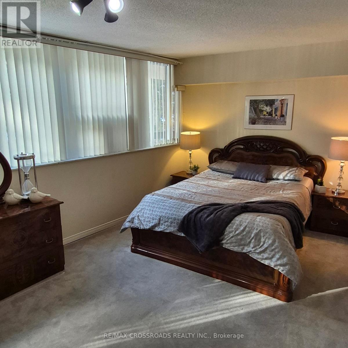 207 - 45 Huntingdale Boulevard, Toronto, ON - Indoor Photo Showing Bedroom