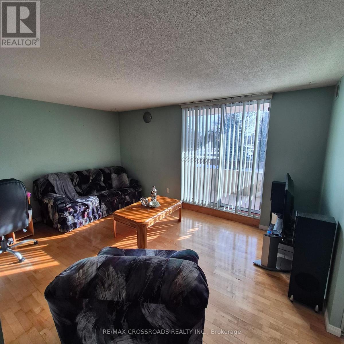 207 - 45 Huntingdale Boulevard, Toronto, ON - Indoor Photo Showing Living Room