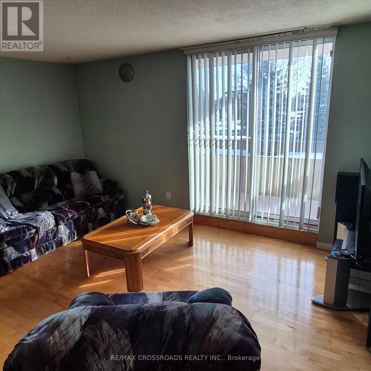 207 - 45 Huntingdale Boulevard, Toronto, ON - Indoor Photo Showing Living Room