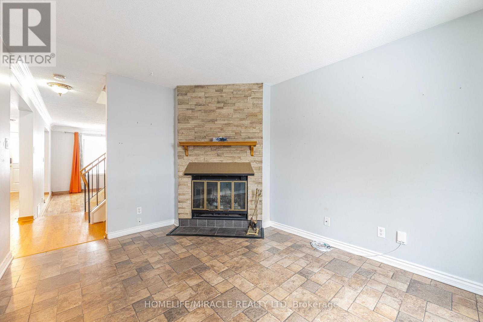 1799 Bromont Way, Ottawa, ON - Indoor Photo Showing Living Room With Fireplace