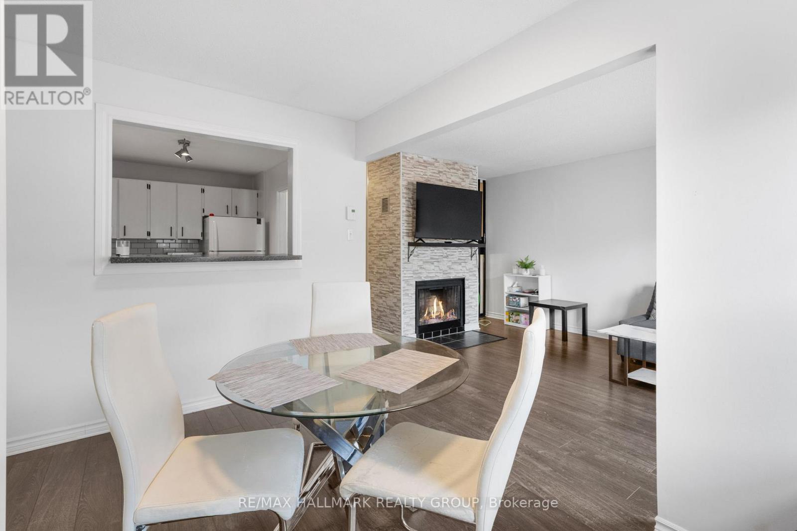 107 - 3445 Uplands Drive, Ottawa, ON - Indoor Photo Showing Dining Room With Fireplace