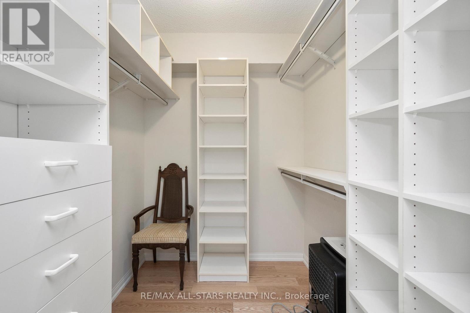 2 walk in closets w organizers - 611 - 610 Bullock Drive, Markham, ON - Indoor With Storage