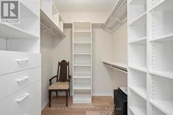 2 walk in closets w organizers -