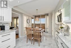 Walk out to balcony overlooking pond. -