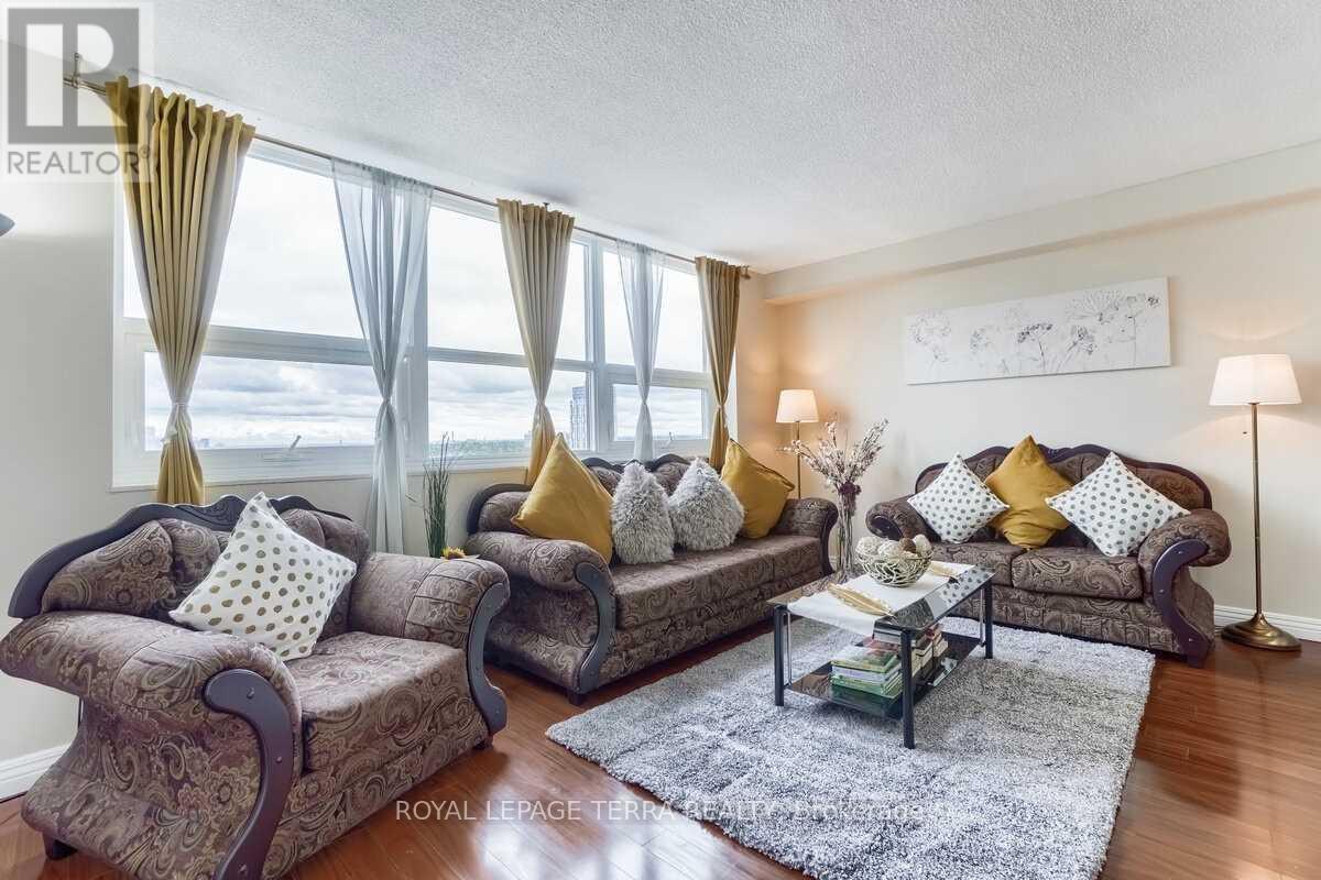 1207 - 4 Lisa Street, Brampton, ON - Indoor Photo Showing Living Room